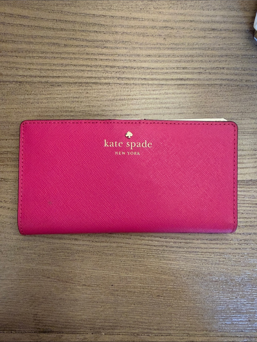 kate spade red zip-around wallet with gold logo